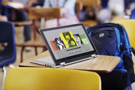 Student Using Inspiron 11 3000 Series 2-in-1 Outside