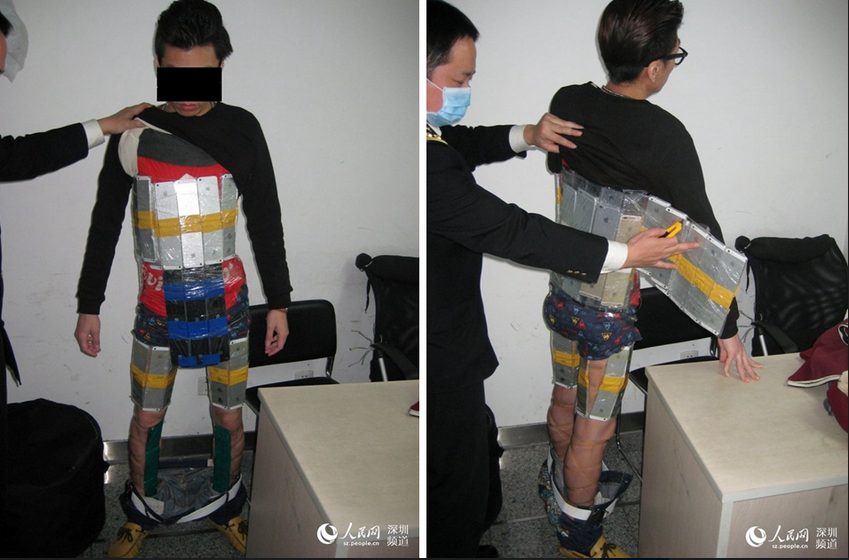 ไม่รอด!! หนุ่มจีนแอบขน iPhone 6 มาจากฮ่องกงถึง 94 เครื่องด้วยการพันรอบตัว