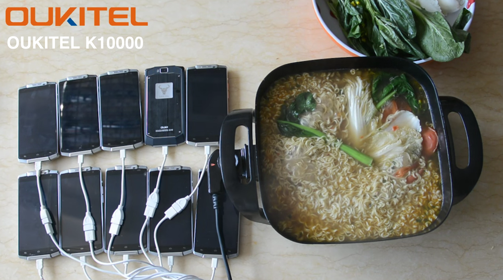 บ้าพลังจัด!! นำเอา Oukitel K10000 จำนวน 10 เครื่องมาให้พลังงานเตาไฟฟ้าต้มมาม่ากินซะเลย (ชมคลิป)