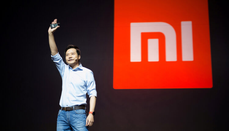 FILE PHOTO - Lei Jun, founder and CEO of China's mobile company Xiaomi gestures during a launch of the company's new products in Beijing, China, September 27, 2016. REUTERS/Stringer/File Photo ATTENTION EDITORS - THIS IMAGE WAS PROVIDED BY A THIRD PARTY. EDITORIAL USE ONLY. CHINA OUT. NO COMMERCIAL OR EDITORIAL SALES IN CHINA.